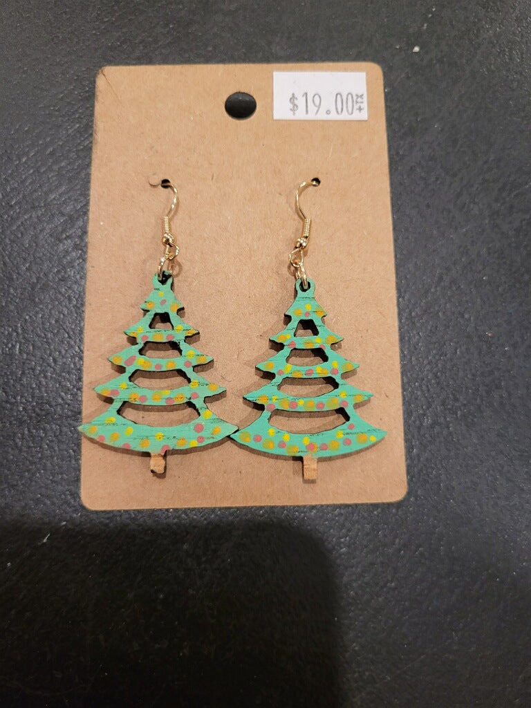 Dangly earring shaped as a greet Christmas tree with hello, red, and orange colored bulbs