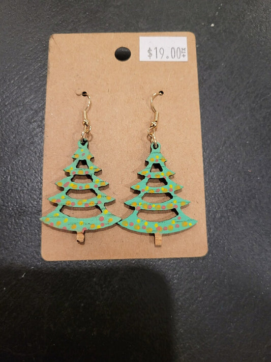 Dangly earring shaped as a greet Christmas tree with hello, red, and orange colored bulbs